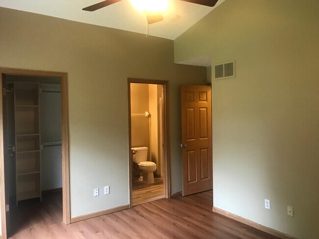 Master bedroom walk in closet & bathroom - 8453 Olenbrook Dr