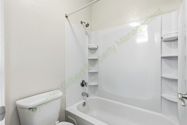 Building Photo - Freshly Updated 2-Bedroom Condo in Gated Lakeshore at Andersen Springs – New Paint & New Carpet!