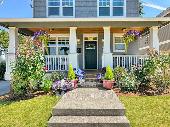 Building Photo - 3938 NE 66th Ave