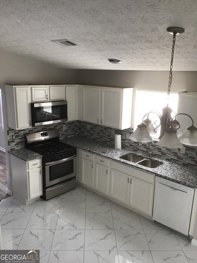 Building Photo - 6345 Peppermill Ln