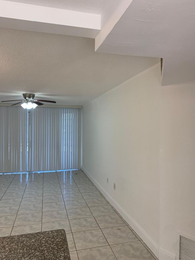 Building Photo - For Rent: Spacious One-Bedroom with Den in...