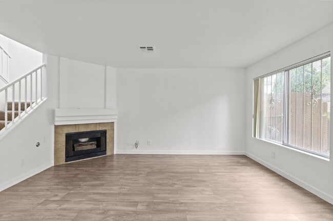 Building Photo - "Charming 3-Bedroom Townhouse Oasis with 2 Full Baths in Las Vegas – 1220 Sq Ft of Comfortable Li...