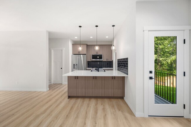 Building Photo - $2595 3 bedroom/2 1/2 bath Clearwood New Construction, Custom Chalet-style Home In Yelm.