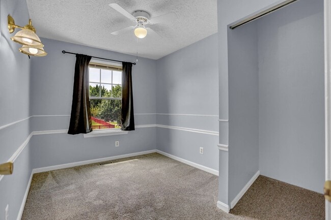 Building Photo - Spacious 4-Level Home with Deck, Workshop ...
