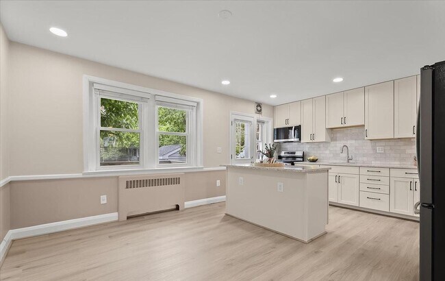 Building Photo - Updated 3BR Catonsville Townhome | Rear Parking + Deck