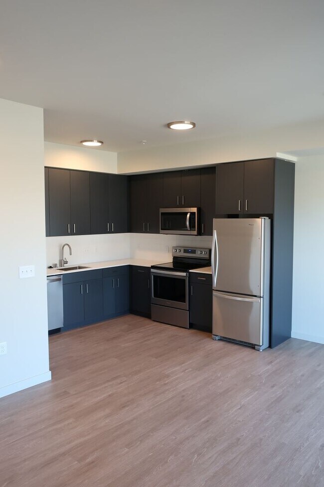 Building Photo - Roomy, 612 Square Foot, 1-Bedroom Home wit...