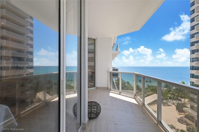 Building Photo - 10225 Collins Ave