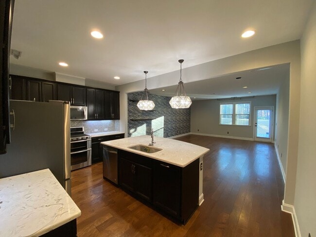 Building Photo - Immaculate Hillsborough Townhome