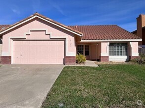 Building Photo - Freshly painted single level 4 bedroom.