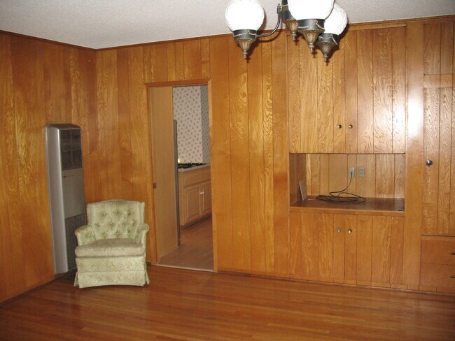 Huge wood paneled bedroom. Loads of windows; and louvered windows - 3121 W Wyoming Ave