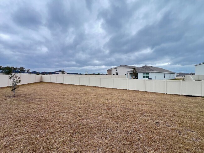 Building Photo - 4BD/2BA Modern Comfort Meets Suburban Serenity in Ocala! WASHER & DRYER INCLUDED!