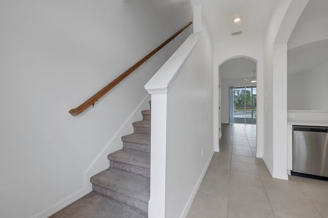 front entrance with arched doorways - 6111 Fairmont Ln