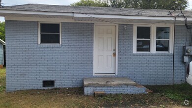 Building Photo - Two Bedroom duplex Available for Rent: One...