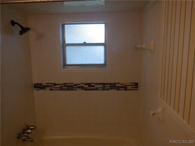 Building Photo - 9513 E Village Green Cir