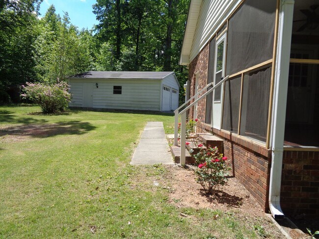 Building Photo - Remodeled Brick Rancher With a Screened Po...