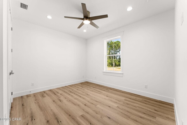 Building Photo - 7021 N Lagoon Dr