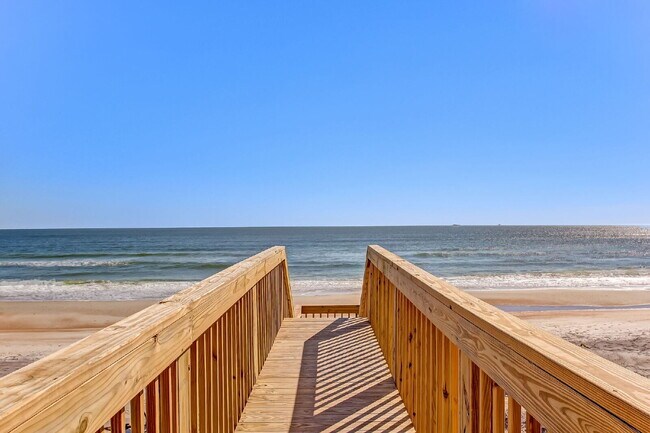 Building Photo - Coastal Living Just 2 Blocks from the Beach | Gated Community + Resort Amenities