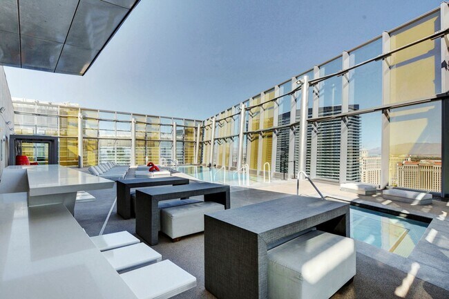 Building Photo - Stunning Strip Views from this Fully Furnished Studio Residence.