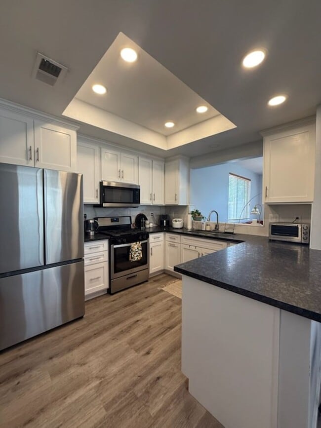 Building Photo - Nicely Renovated Home in Gated Community -...