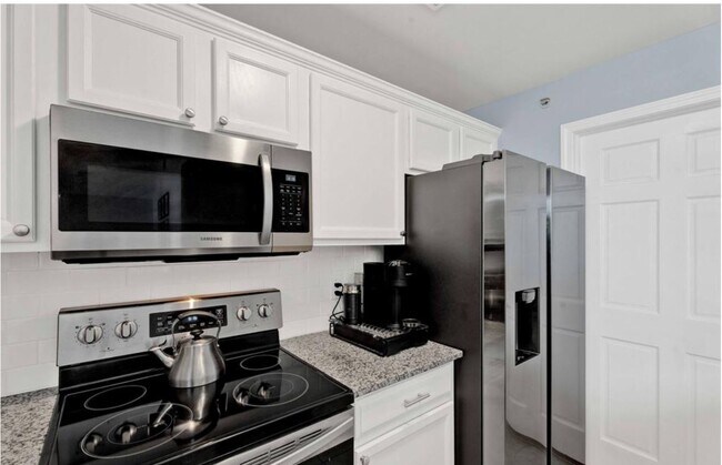 Building Photo - 7869 Ambassador Dr