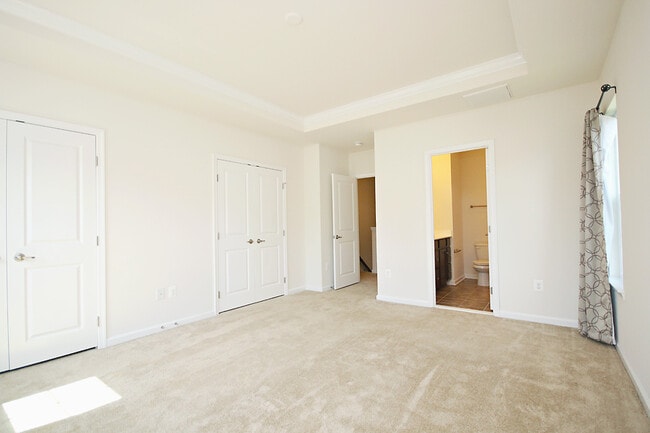Building Photo - Pet-Friendly N. Albemarle End-Unit Townhome
