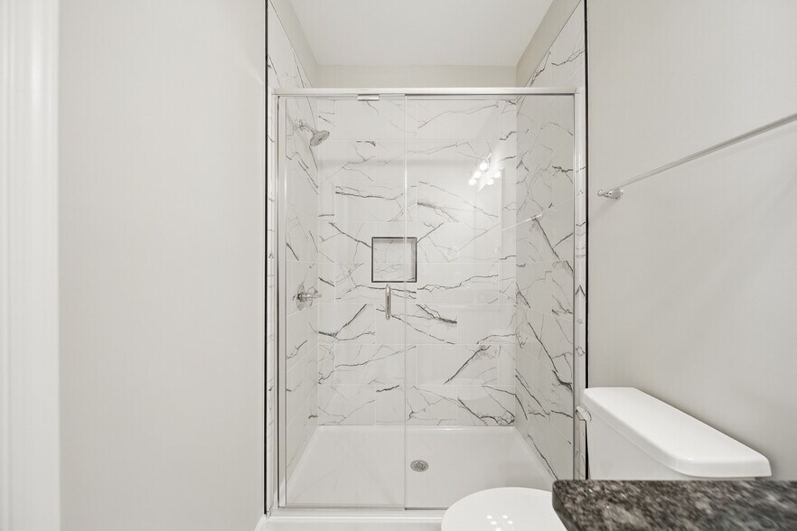 Main bedroom bathroom tile shower - 216 Legion Dr