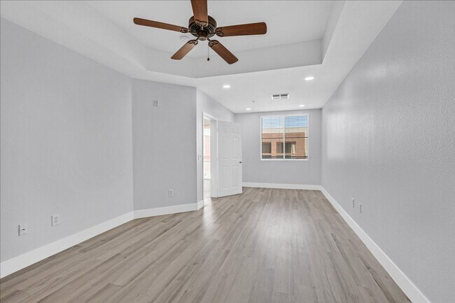 Building Photo - Top level 2 bedroom condo located in guard...