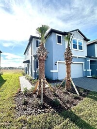 Building Photo - 8795 Coqui Song Ln