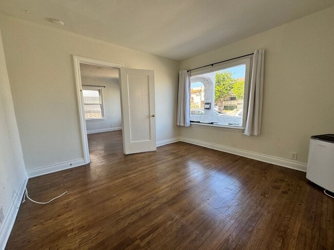 Building Photo - Two Bedroom Front House near Westside Village