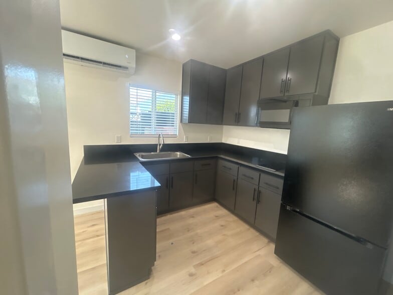 New counter and ,cabinets - 8901 Firestone Plz