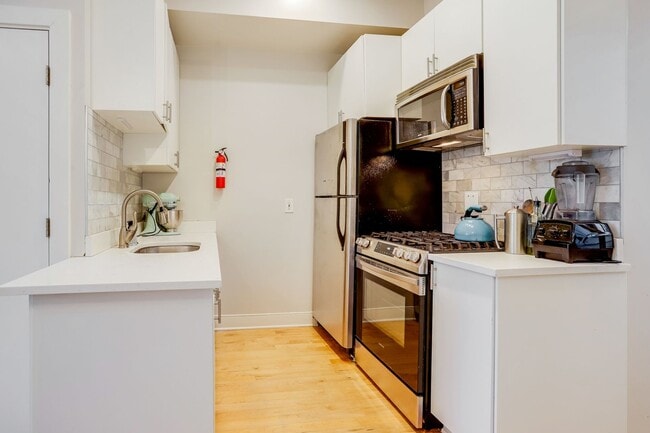 Building Photo - Live Bright in Shaw: Your Perfect One-Bedroom Awaits