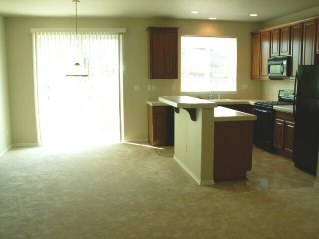 Building Photo - Gorgeous Single Family home in great condition with private patio at unbeatable Price!  - Coming ...