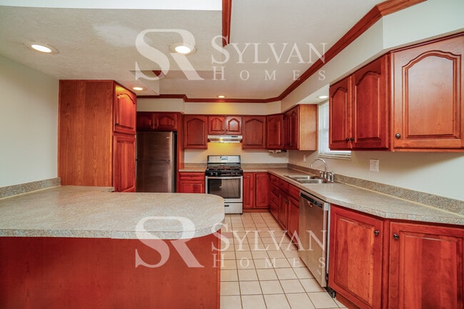 Building Photo - Lease today! No extra charge for contentme...