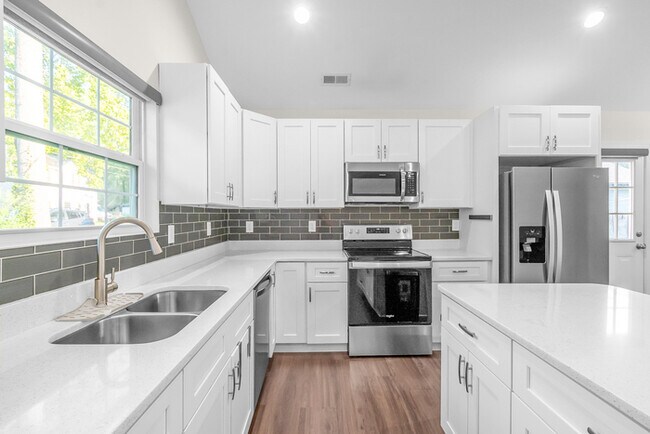 Building Photo - LIVE CLOSE TO THE ACTION — Modern 3-Bedroom Rental in Charlotte’s Reid Park!