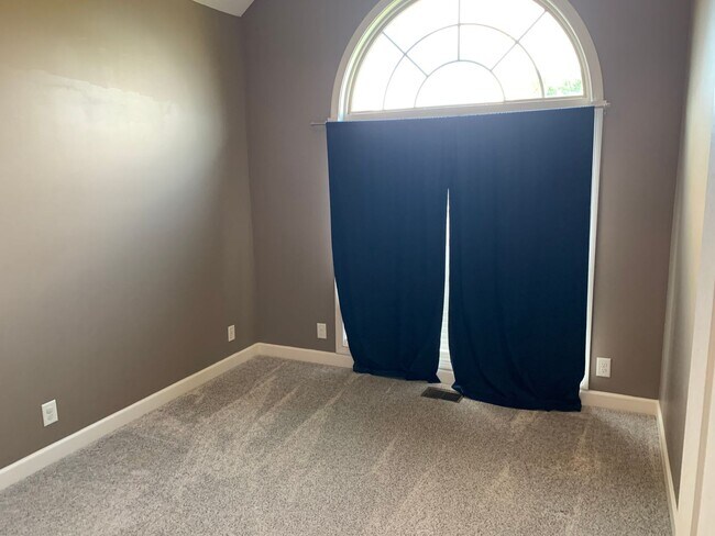 Building Photo - Luxury Living! Beautiful Brick Home in Sango with 3 car garage.
