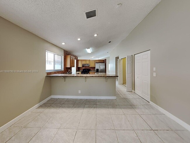 Building Photo - 3833 NW 7th Pl
