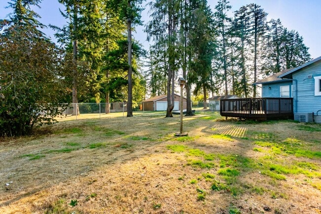 Building Photo - Spacious Lakewood Home with Basement & Outdoor Living **$1000 OFF FIRST MONTH'S RENT**