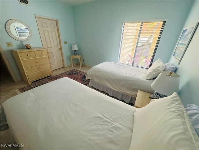 Building Photo - 6760 Pelican Bay Blvd
