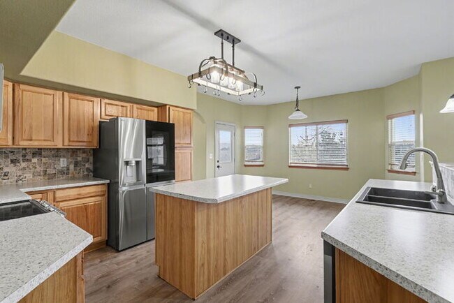 Building Photo - Spacious 5-Bedroom Home Backing to Open Space with Mountain Views