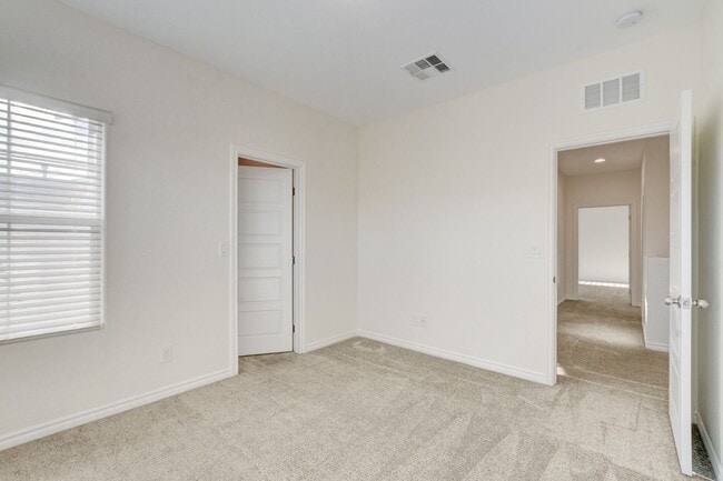 Building Photo - 4 Bedroom Townhouse in Tule Springs Coming Soon!