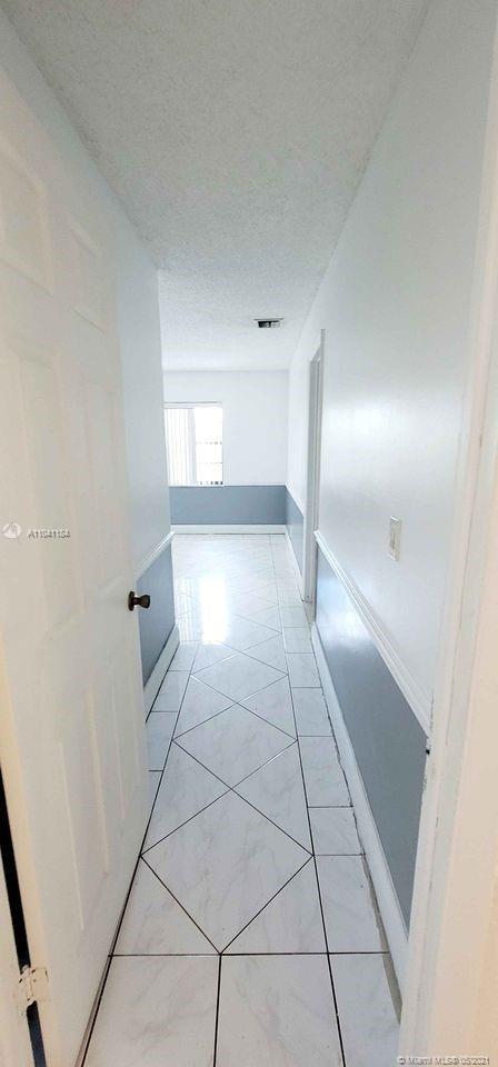 Building Photo - 6991 NW 20th Ct