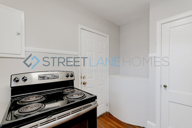 Building Photo - REDUCED! - NOW OFFERING HALF OFF FIRST FUL...