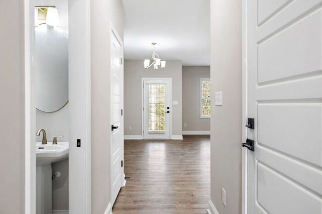 Building Photo - Luxury New 3BR Townhomes | Garage + Pool | 7 min to Fort Bragg