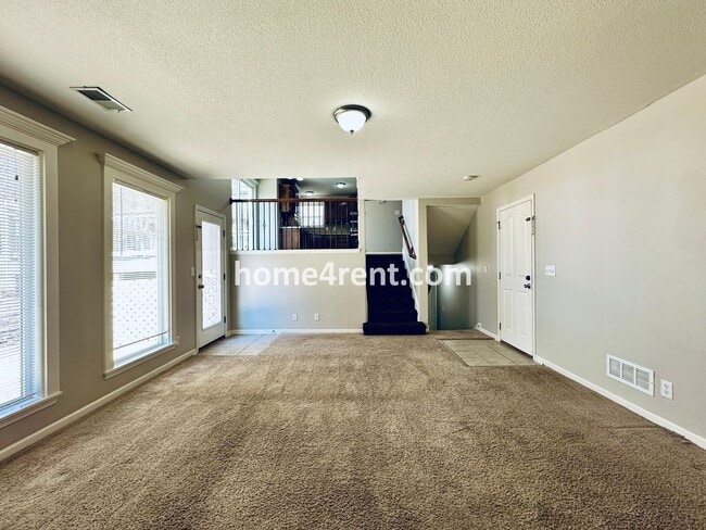 Building Photo - Spacious Four Bedroom Northland Home with a Finished Basement, 3 car garage and Fenced Yard!