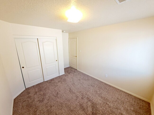 Building Photo - Gorgeous 4-bedroom, 2-bath home featuring two spacious living areas