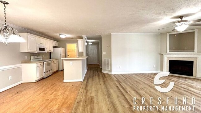 Building Photo - BRAND NEW FLOORING!!! - 2 Bed, 2 Bath Cond...