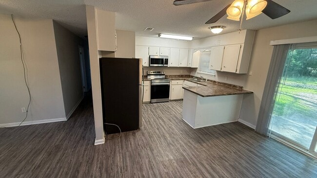Building Photo - RATE DROP ALERT! (was $1725/month)