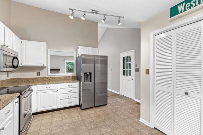 Building Photo - Spacious 4-Bedroom Carrboro Home with Dual Primary Suites & Community Amenities