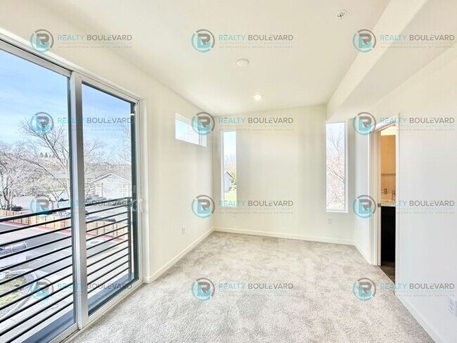 Building Photo - Modern 2 Bedroom 2Bath Townhome with Dual Patios & Designer Finishes near Truckee River