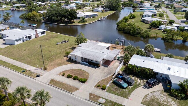 Building Photo - RENT THIS CANAL FRONT HOME WITH ZERO DEPOSIT DOWN